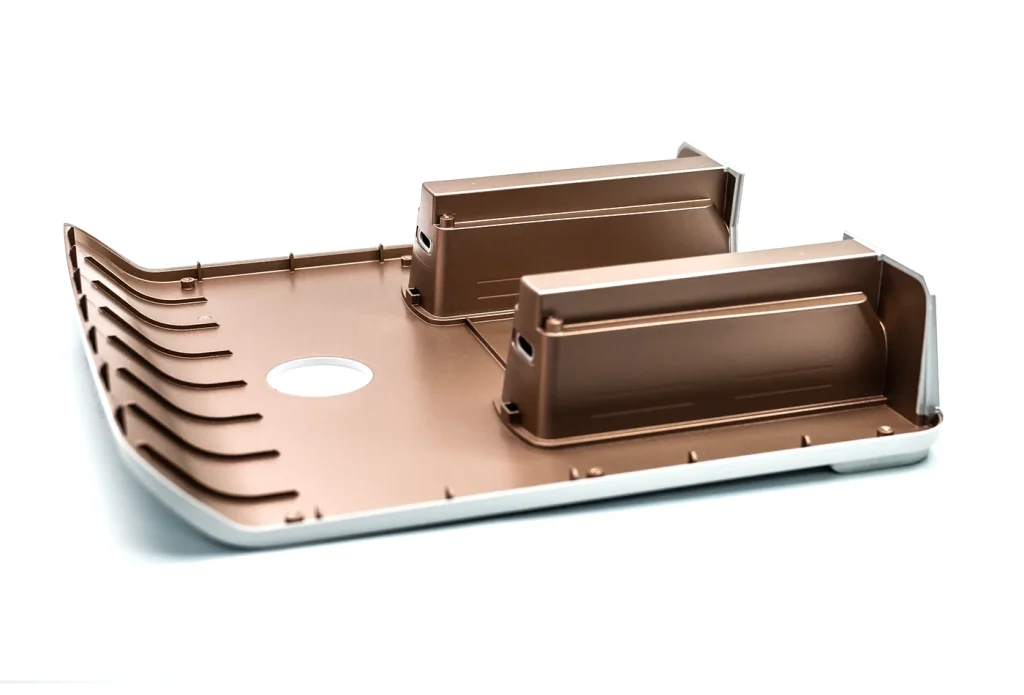 A large plastic part which gets placed in a hard tool. The EMI applied is PPG 599-Y2000.